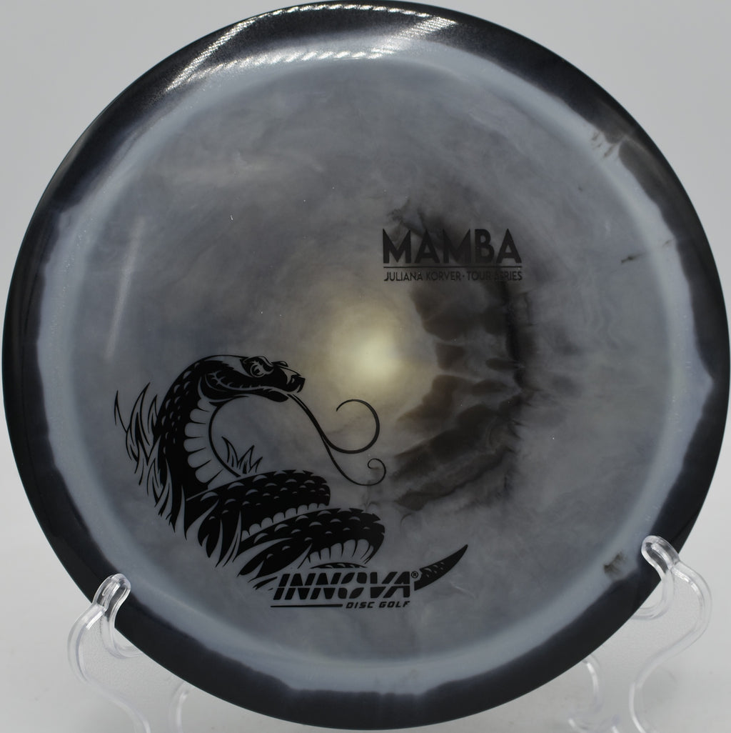 Glow Halo Star Mamba Juliana Korver 2025 Tour Series driver trusted for long turnovers at Water Works Park Disc Golf Course in Kansas City, Missouri.