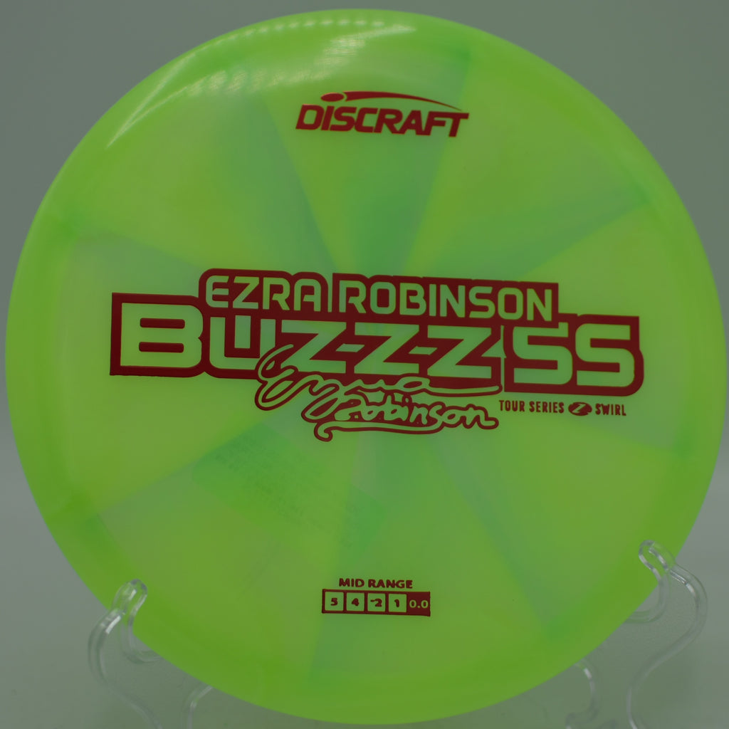 2025 Z Swirl Buzzz SS Ezra Robinson powering a controlled drive at North Cove Disc Golf Course in Marion, North Carolina.