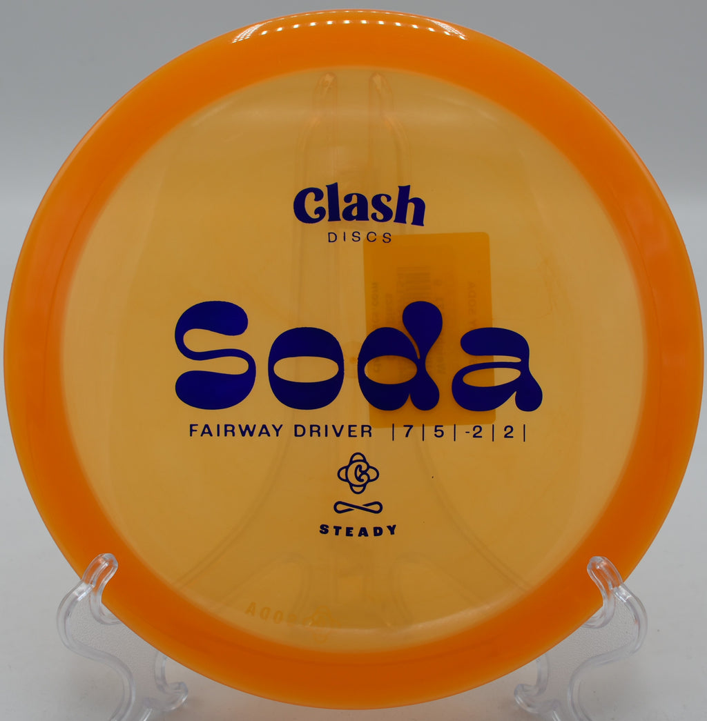 Clash Discs Steady Soda settling softly near the basket on Hole 3 at Water Works Park Disc Golf Course, Kansas City, Missouri.