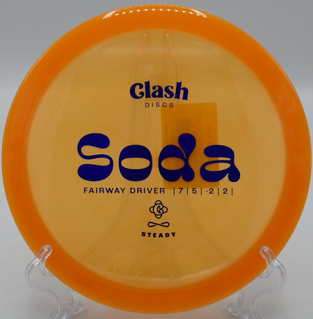 Clash Discs Steady Soda settling softly near the basket on Hole 3 at Water Works Park Disc Golf Course, Kansas City, Missouri.