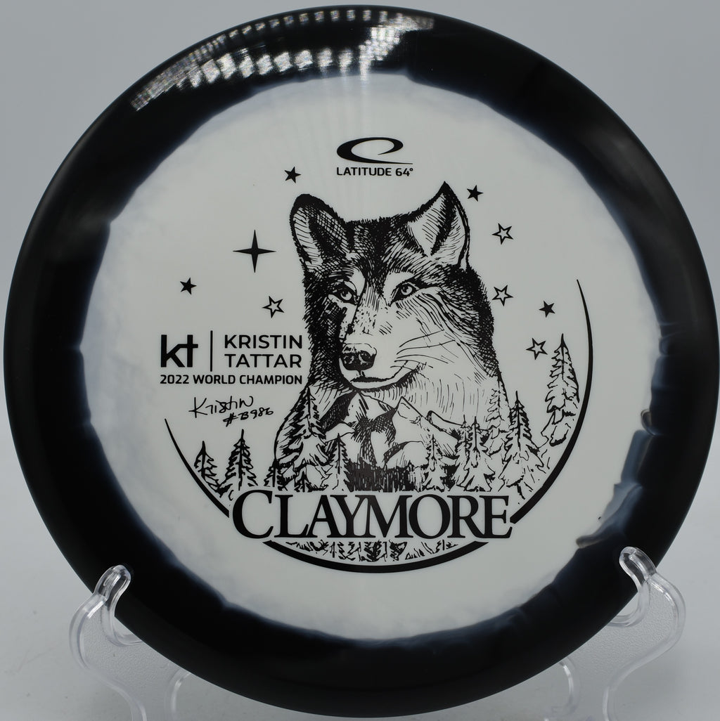 Gold Orbit Claymore Kristin Tattar Latitude 64° glidey midrange flying dead straight at Moraine State Park Disc Golf Course in Portersville, Pennsylvania.