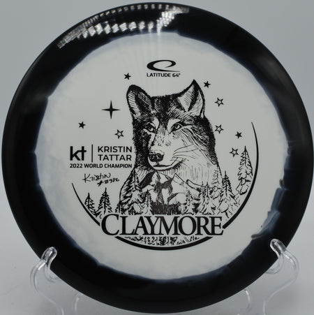 Gold Orbit Claymore Kristin Tattar Latitude 64° glidey midrange flying dead straight at Moraine State Park Disc Golf Course in Portersville, Pennsylvania.