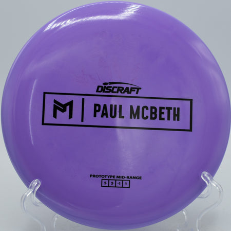 Malita midrange disc carving a smooth anhyzer through woods at Fox Run Meadows in Jeffersonville, Vermont