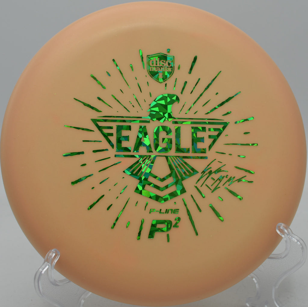 Discmania Eagle Totem P2 shining through a wooded fairway on a clean hyzer approach at The Fort in Ogden, Utah.