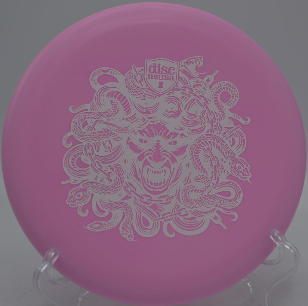 Limited Edition Medusa Stamp Hard Exo Lumen Link Discmania putter glowing bright on the green at Idlewild Disc Golf Course in Burlington, Kentucky.