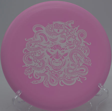 Limited Edition Medusa Stamp Hard Exo Lumen Link Discmania putter glowing bright on the green at Idlewild Disc Golf Course in Burlington, Kentucky.