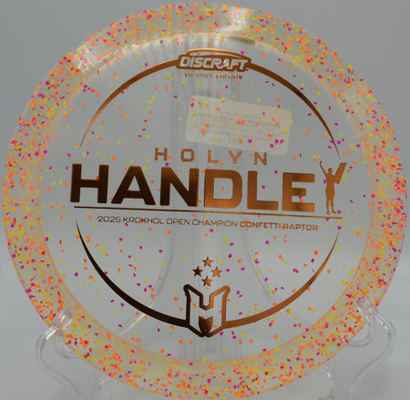 Victory Edition Z Confetti Raptor holding a tight hyzer at Hornets Nest Disc Golf Course in Charlotte, North Carolina