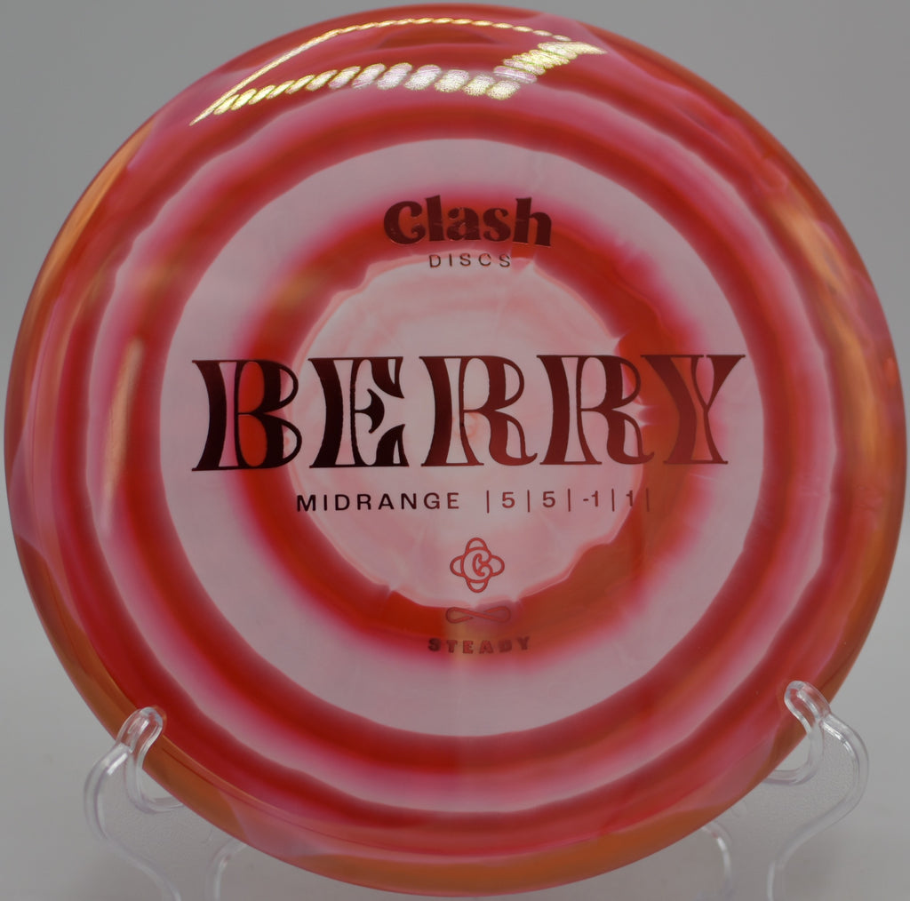 Clash Berry midrange gliding on a hyzer flip at Blue Ribbon Pines in East Bethel, Minnesota