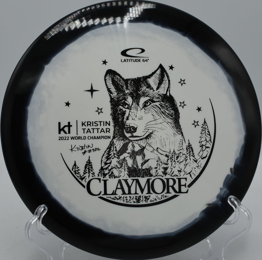 Latitude 64° Gold Orbit Claymore Kristin Tattar signature disc carving a tunnel shot at Water Works Park Disc Golf Course in Kansas City, Missouri.