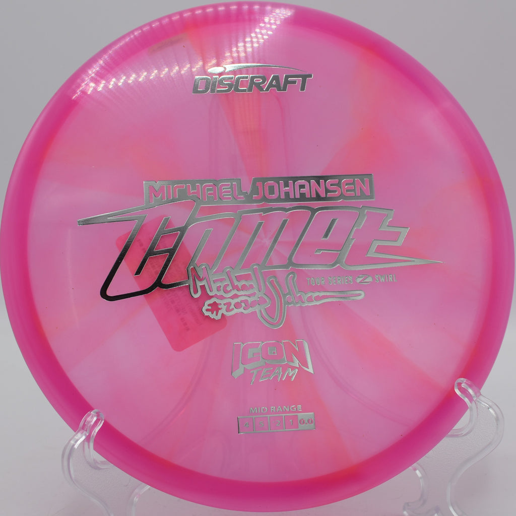 MJ Comet in Z Swirl plastic carving tight lines through woods at Idlewild DGC in Burlington, Kentucky