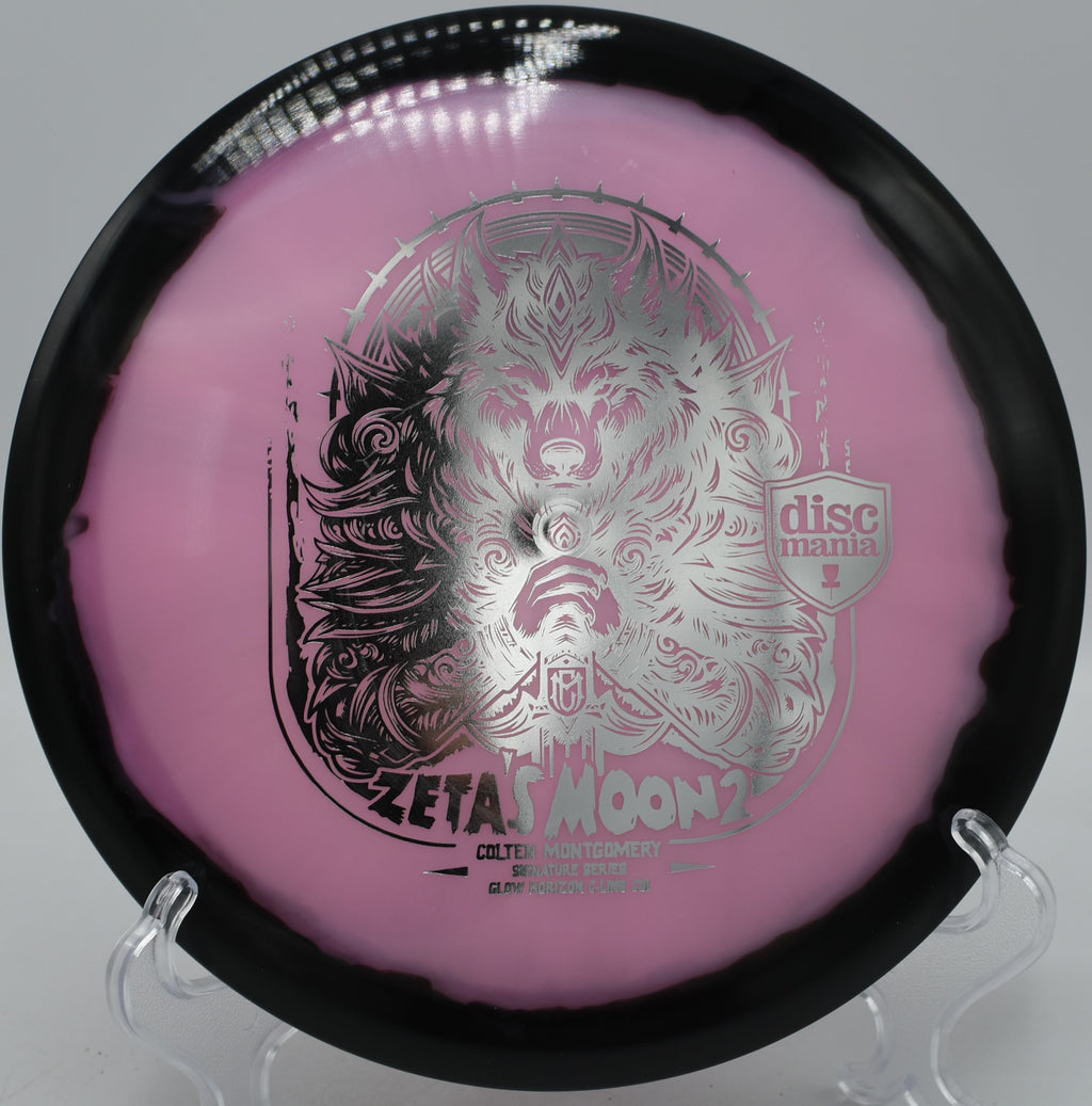 Discmania Glow Horizon C-Line CD1 Zeta’s Moon 2 Colten Montgomery signature edition glowing through wooded lines at Moraine State Park Disc Golf Course in Portersville, Pennsylvania.
