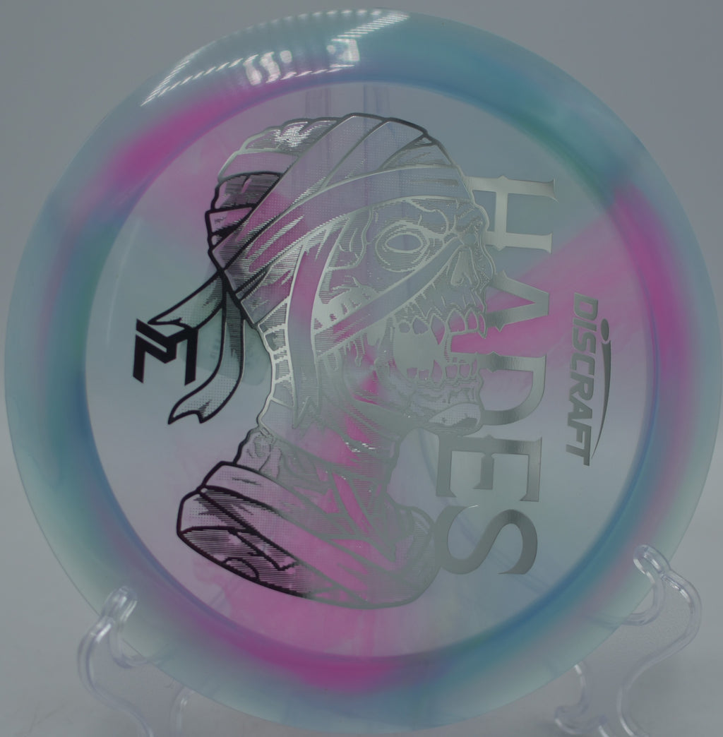 Z Swirl Mummified Hades flying high over the fairway with late fade at Hornets Nest Disc Golf Course in Charlotte, North Carolina.