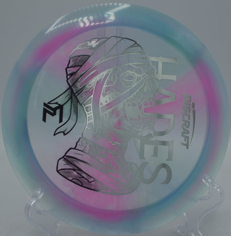 Z Swirl Mummified Hades flying high over the fairway with late fade at Hornets Nest Disc Golf Course in Charlotte, North Carolina.