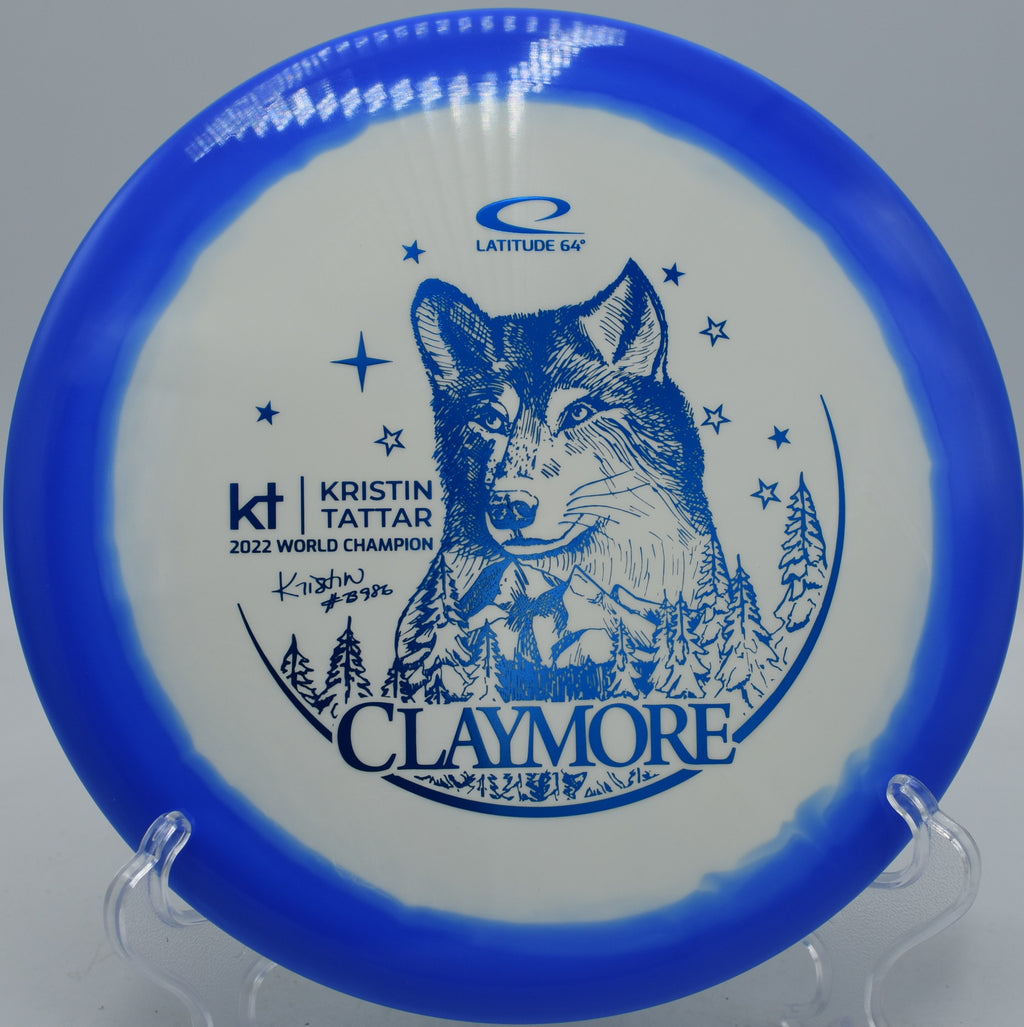 Gold Orbit Claymore Kristin Tattar Latitude 64° stable midrange carving fairways at Northwood Black Disc Golf Course in Morton, Illinois.