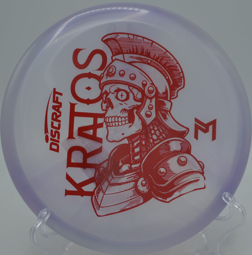 Discraft Sceletus Kratos resting near the chains after a clean release at Idlewild Disc Golf Course in Burlington, Kentucky.