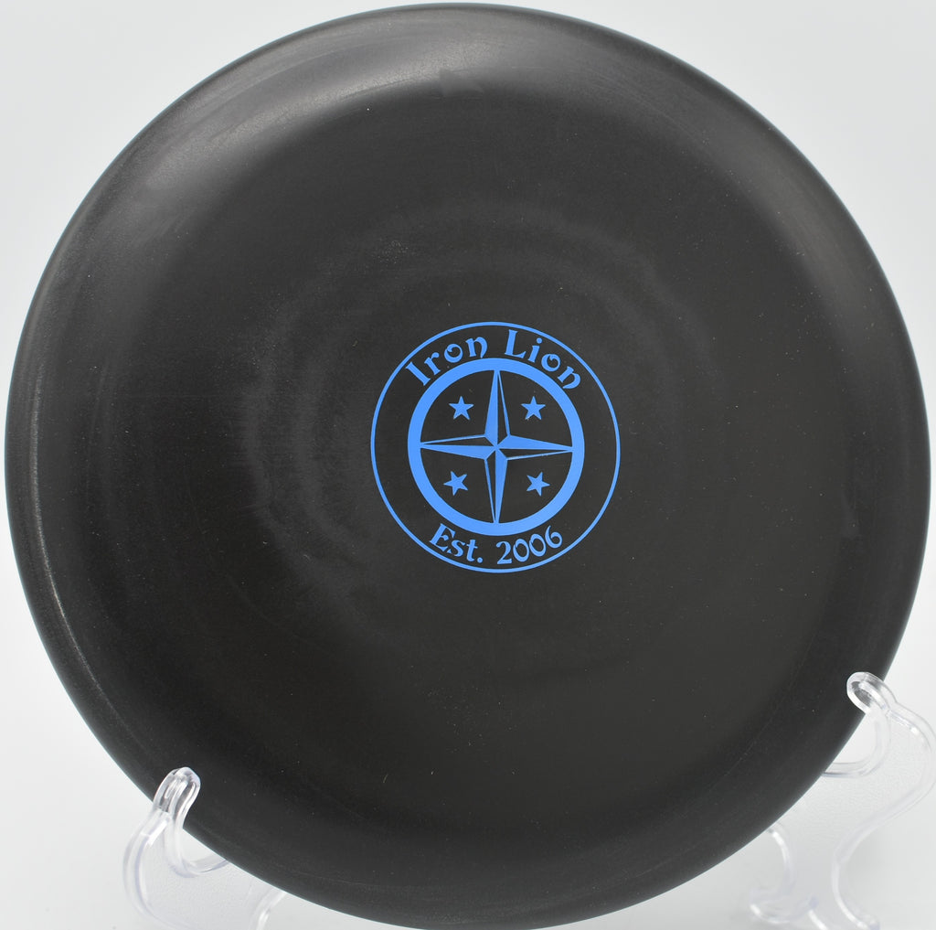 Aviar Driver flying flat off the tee for a controlled putter drive at Cedar Hill Disc Golf Course in Nashville, Tennessee.