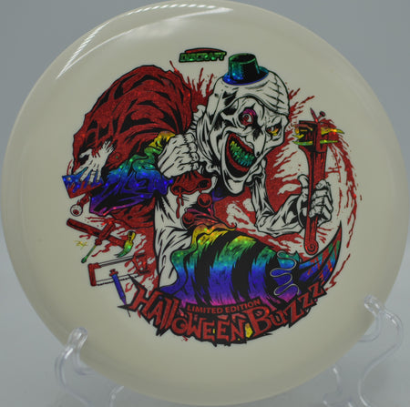 Limited Edition Halloween 2025 Glo Buzzz triple stamp thrown forehand at Fort Steilacoom Disc Golf Course in Lakewood, Washington.