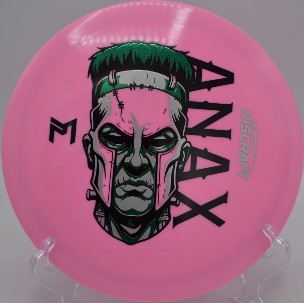 Discraft ESP Tri-Foil Anax carving a long flex line down the fairway at Creekside Disc Golf Course in Salt Lake City, Utah.