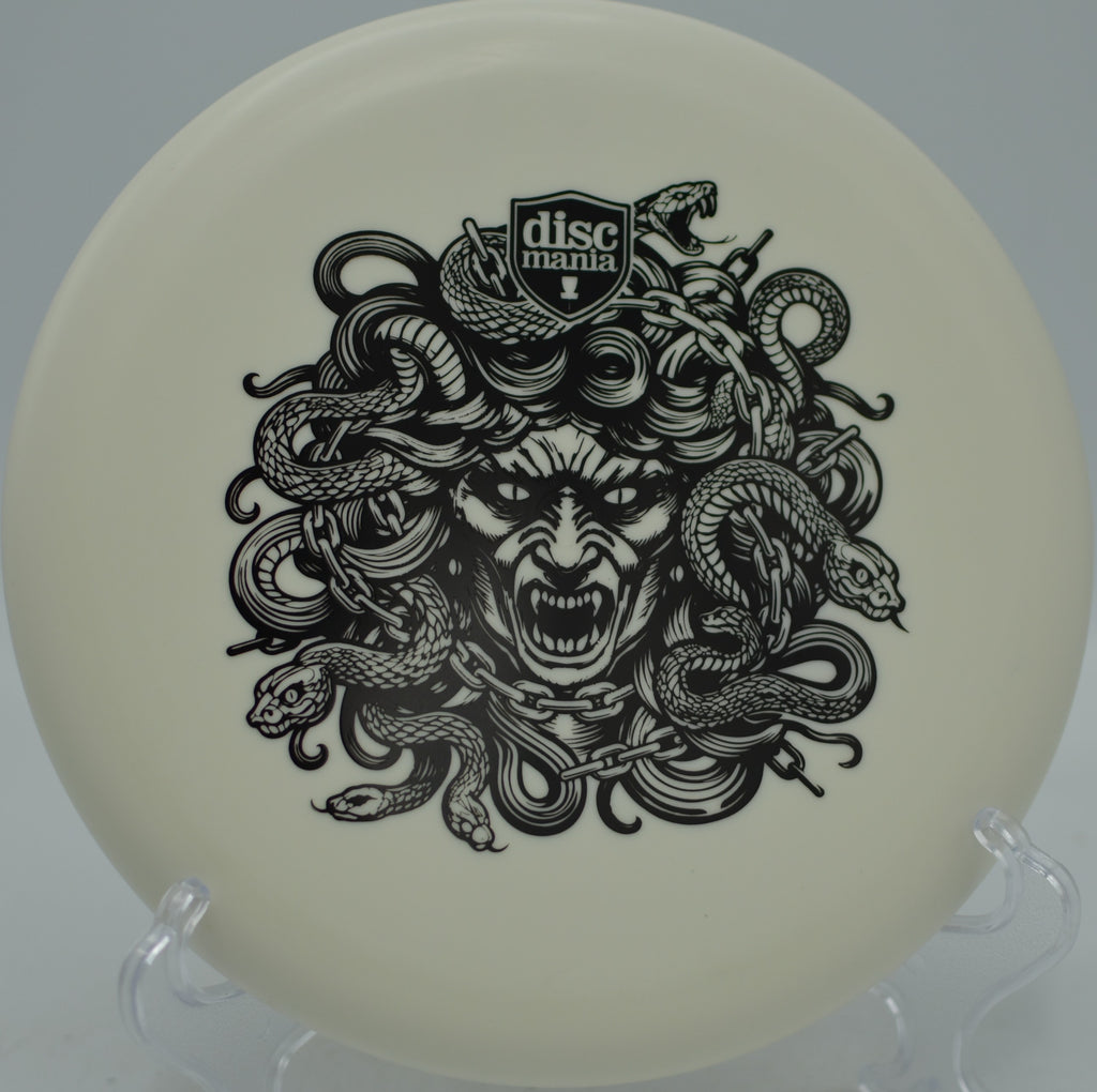 Discmania Lumen Link Medusa glow beaded putter flying straight under moonlight at Harmon Hills Disc Golf Course in Fall Branch, Tennessee.