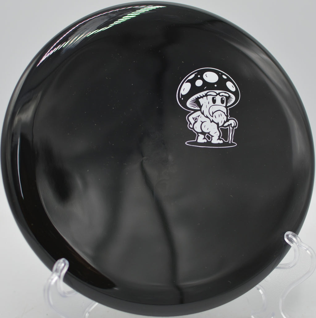 Rot by Doomsday Discs Survival plastic fired confidently at Veterans Park Disc Golf Course in Arlington, Texas.