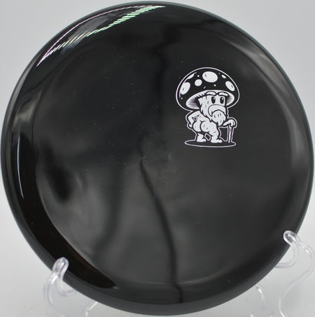 Rot by Doomsday Discs Survival plastic fired confidently at Veterans Park Disc Golf Course in Arlington, Texas.