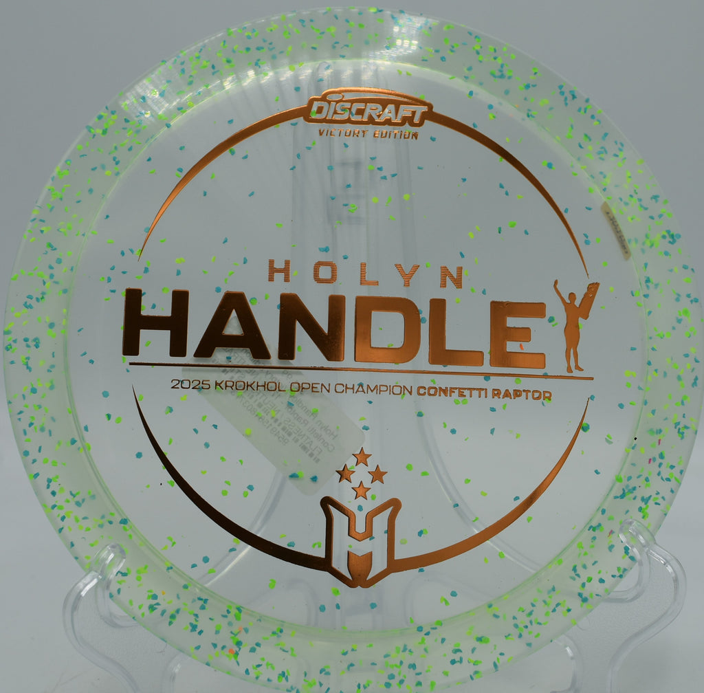 Discraft Z Confetti Raptor parked under the basket at Eagles Crossing in Hawk Point, Missouri