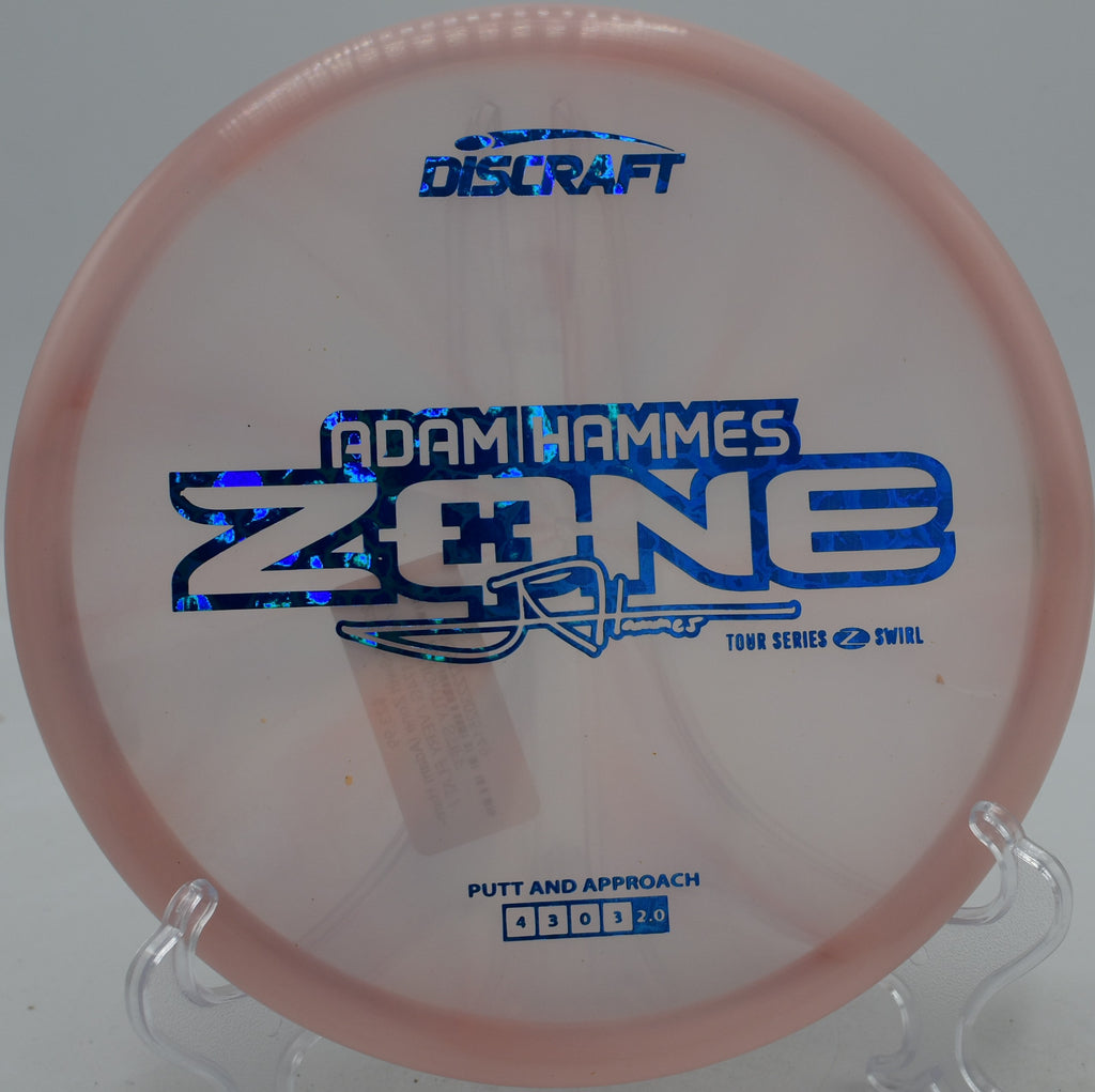 Adam Hammes 2025 Z-Swirl Zone overstable approach disc parked on a forehand upshot at Maple Hill Disc Golf Course in Leicester, Massachusetts.