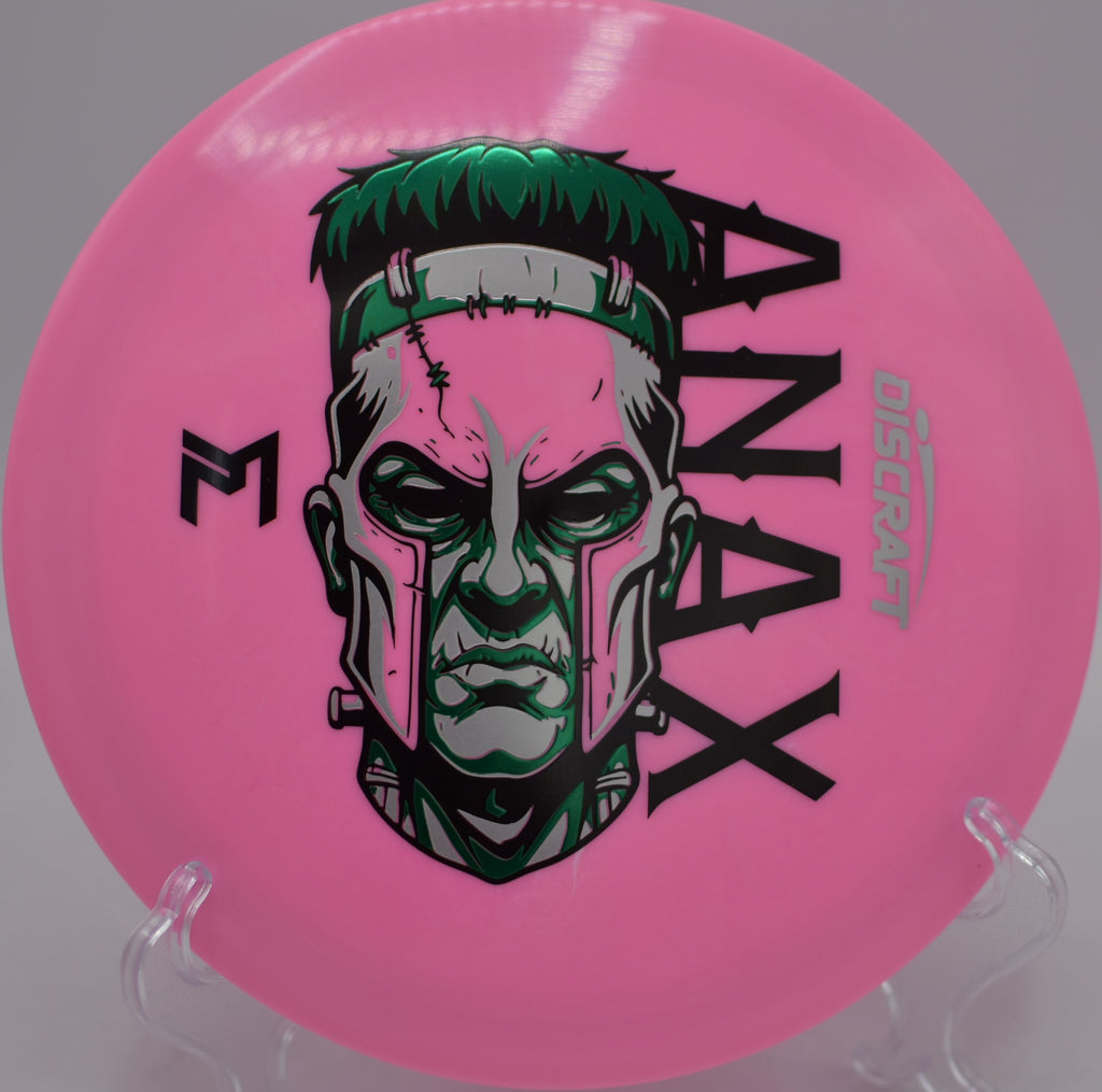 Player crushing a Tri-Foil Anax on a max-distance drive at Mulligans Creekside Disc Golf Course in Logan, Utah.