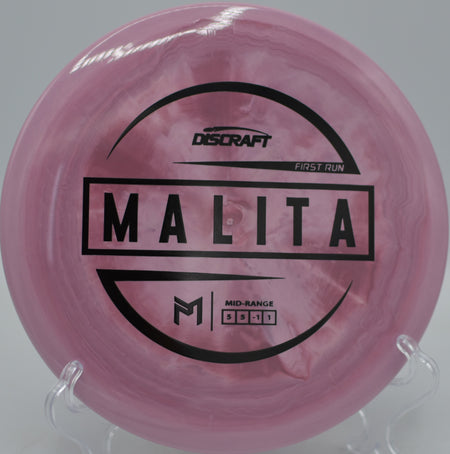 Discraft First Run ESP Malita gliding straight down the fairway at Maple Hill Disc Golf Course in Leicester, Massachusetts.