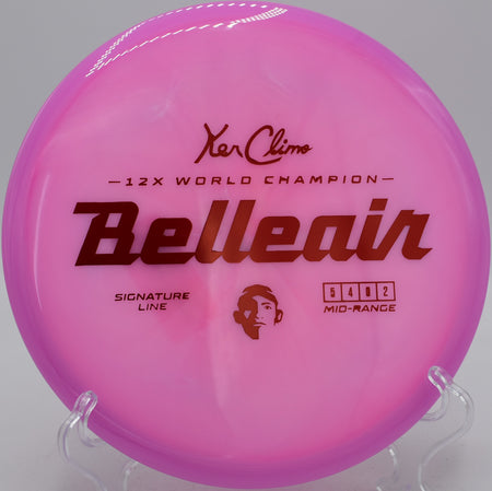 Signature Line Belleair mid-flight on a tunnel shot at Eagles Crossing Disc Golf Course in Hawk Point, Missouri