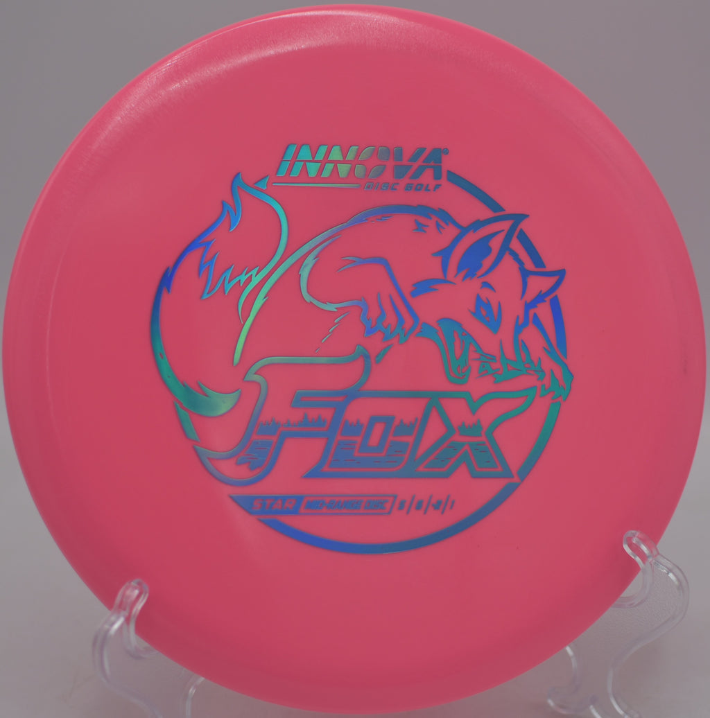 Innova Star Fox released flat for a technical line through trees at DeLaveaga Disc Golf Course in Santa Cruz, California.