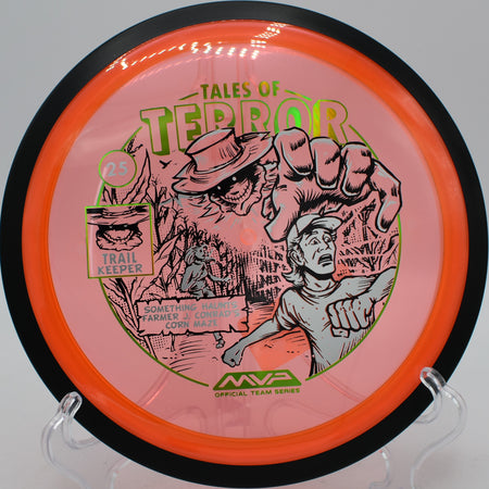 Proton Trail Halloween disc on a flex line fade into the woods at Oshtemo Township Park, Michigan.