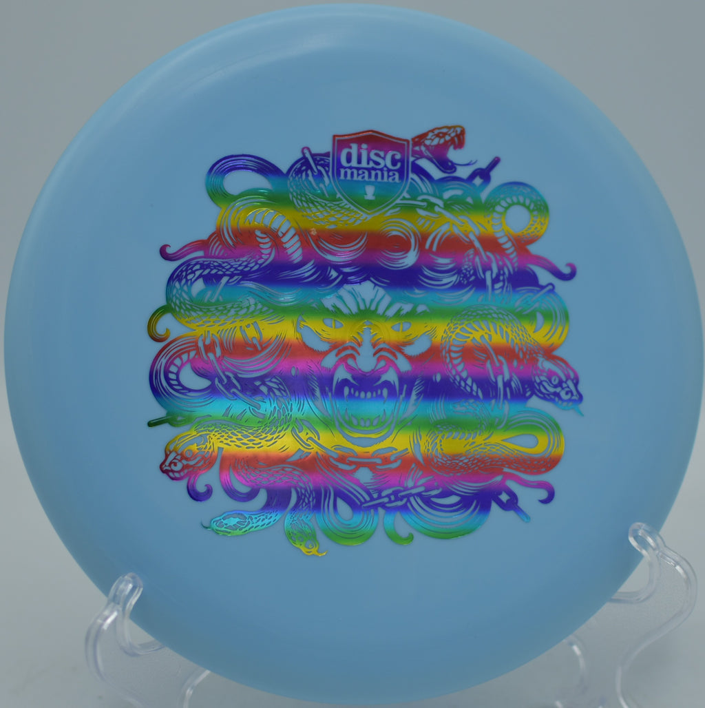 Discmania Hard Exo Lumen Link Medusa Stamp glowing putter fading softly into chains at Rollin’ Ridge Disc Golf Course in Reedsville, Wisconsin.