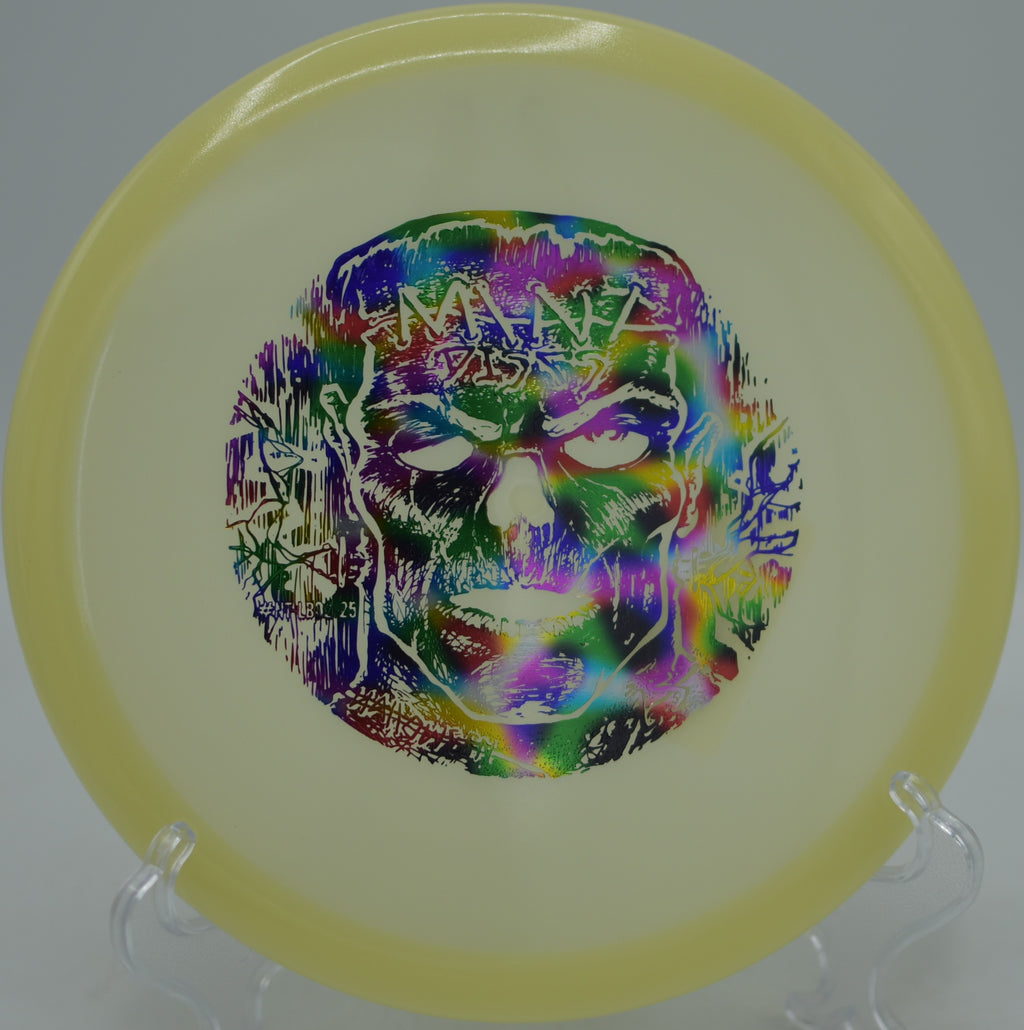 Night round shot with Mint Discs Nocturnal Glow Lobster glowing bright at Cedar Hill Disc Golf Course in Nashville, Tennessee.