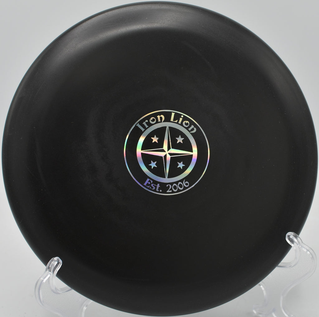 Big Bead Aviar Driver floating toward the pin on a slight hyzer at Hornets Nest Park in Charlotte, North Carolina.