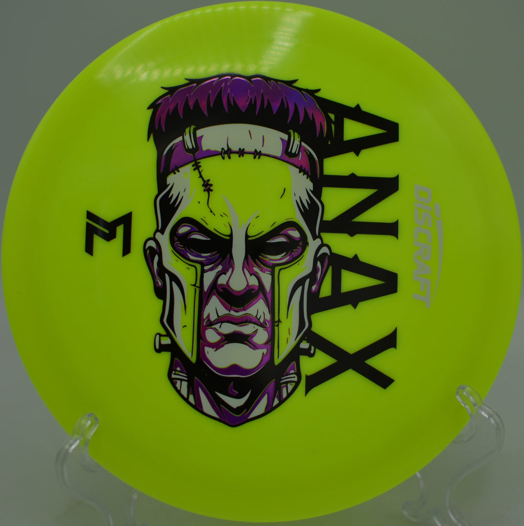 Paul McBeth Signature Tri-Foil Anax flying flat and straight through a mountain backdrop at Art Dye Disc Golf Course in American Fork, Utah.