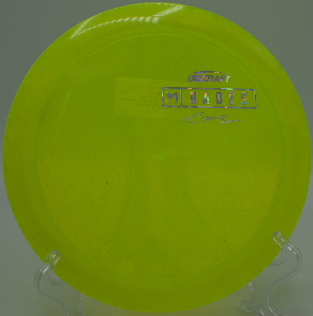 Discraft Z Sparkle Hades driver flying on a flex shot at Milo McIver State Park Disc Golf Course in Estacada, Oregon.