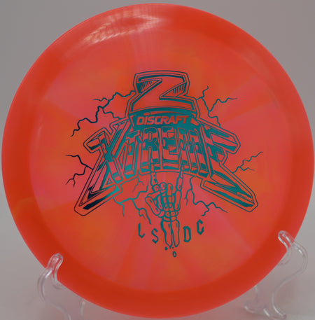 Discraft Xtreme Ledgestone Edition flying flat and controlled with heavy fade at Morley Field Disc Golf Course in San Diego, California.