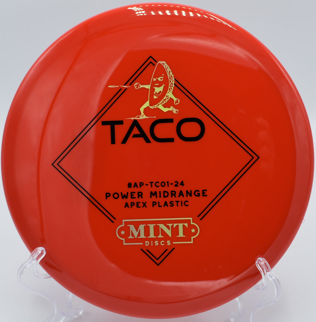 Mint Discs Taco in Apex plastic flying a flat midrange approach shot with controlled fade at Harmony Bends Disc Golf Course in Columbia, Missouri