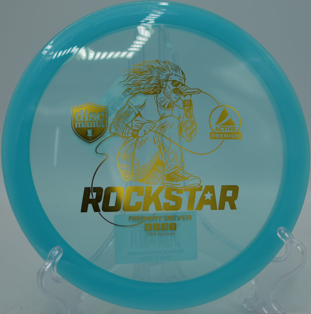 Active Premium Rockstar Discmania fairway driver drifting clean tailwind lines at Harmon Hills Disc Golf Course in Fall Branch, Tennessee.