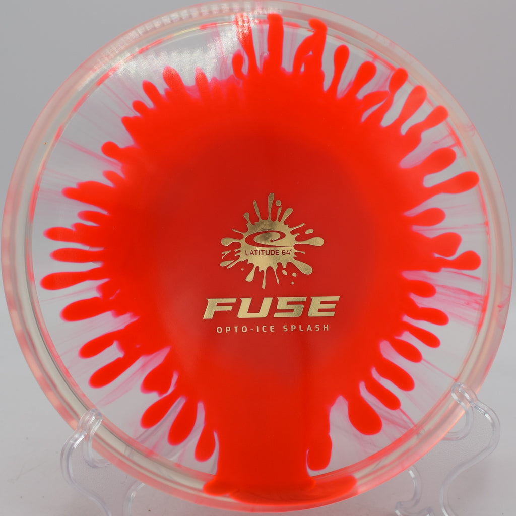Opto-Ice Splash Fuse Latitude 64° midrange disc carving precision lines at Northwood Black Disc Golf Course in Morton, Illinois.