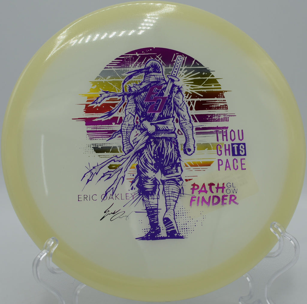 Eric Oakley Glow Pathfinder midrange glowing under UV light during night round at Trophy Lakes DGC in Johns Island, South Carolina