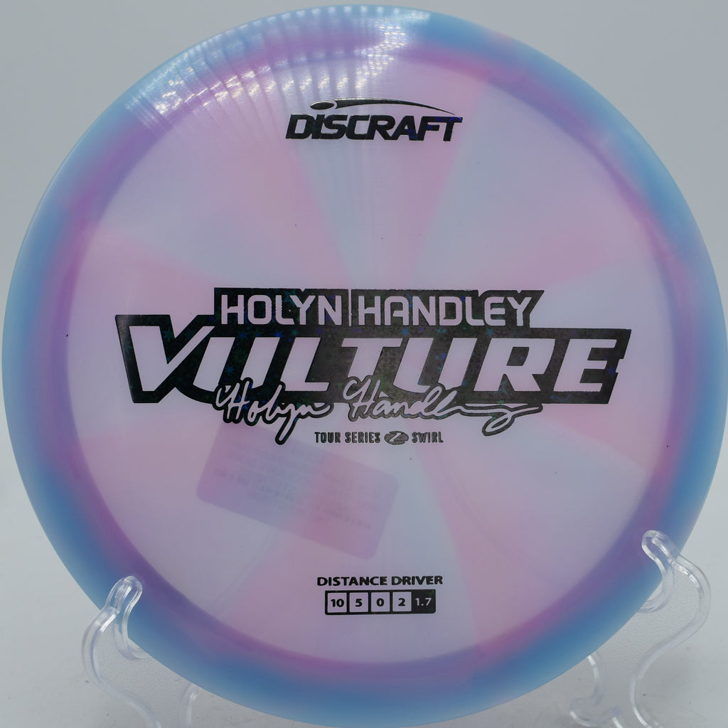 Holyn Handley 2025 Z-Swirl Vulture fairway driver carving a controlled flex line at Maple Hill Disc Golf Course in Leicester, Massachusetts.