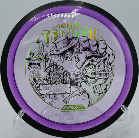 MVP Proton Trail Halloween stamped disc caught mid-flight at Moraine State Park, Portersville PA—great for stand-up hyzer shots and late fades.