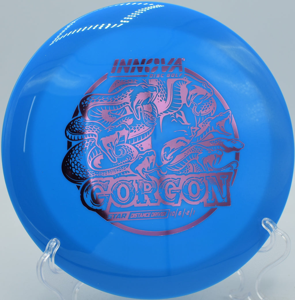 Star plastic Gorgon gliding down a tunnel shot at Maple Hill Disc Golf Course in Leicester, Massachusetts