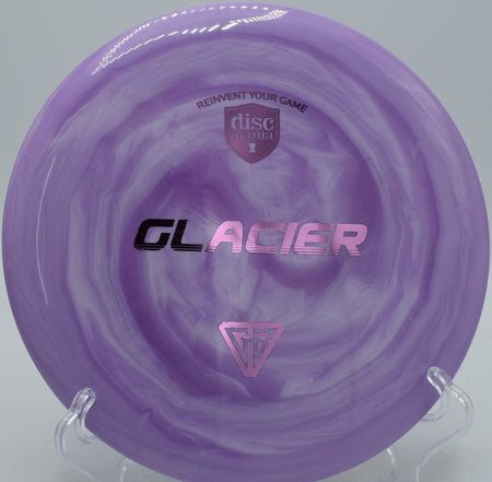 Discmania Swirl S-Line Glacier Creator Series driver shaping a long S-curve at Hornets Nest Disc Golf Course in Charlotte, North Carolina