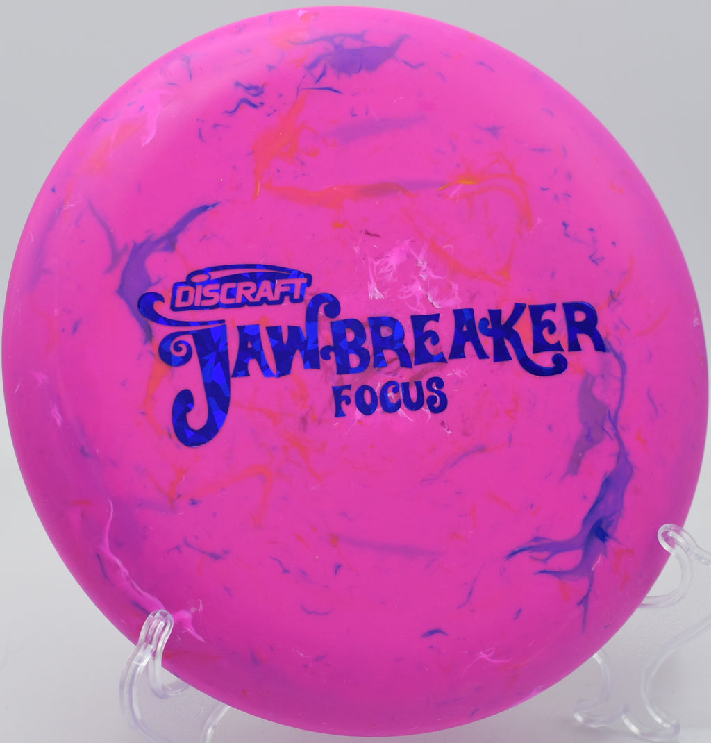 Soft-focus photo of a player gripping the tacky Jawbreaker Focus at Lakewood King County Park, WA.