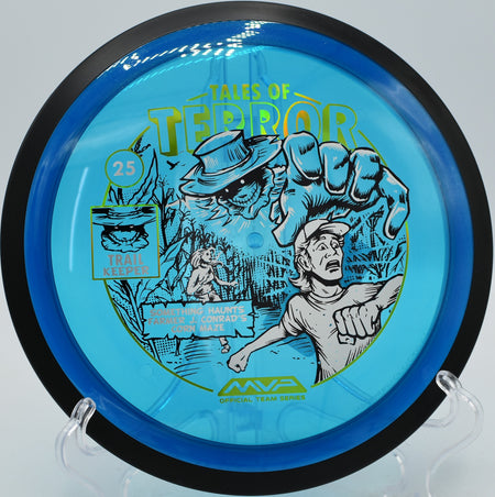 MVP Trail gliding laser-straight through pine-lined fairways at Castle Hayne Disc Golf Course in North Carolina during a Halloween glow round.