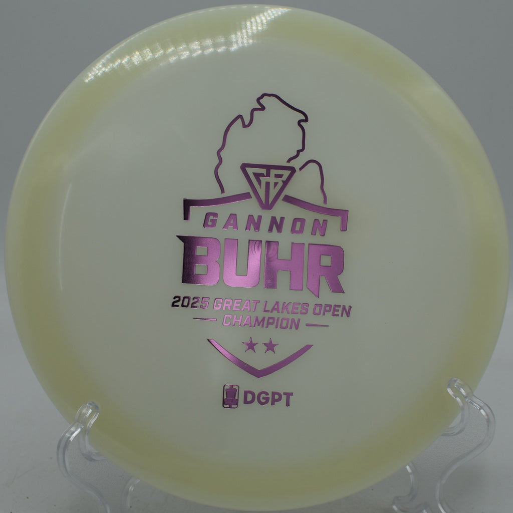 Gannon Buhr Glow C-Line FD2 Triumph Series 2025 Team disc glowing brightly on a turnover at Moraine State Park Disc Golf Course in Portersville, Pennsylvania.