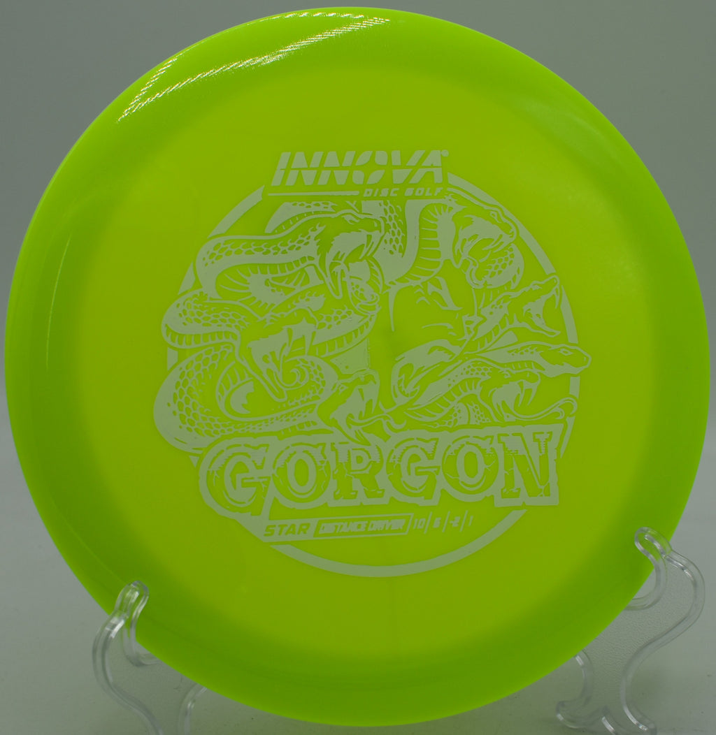 Red Star Gorgon cutting through a tailwind at Token Creek Disc Golf Course in Madison, Wisconsin